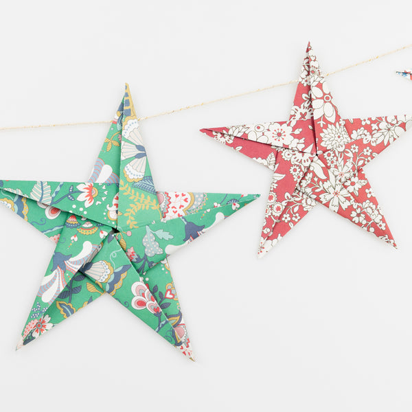 Let our star garland, designed with joyful Liberty star and floral prints and gold foil details, add an elegant touch to your Christmas décor. Image5
