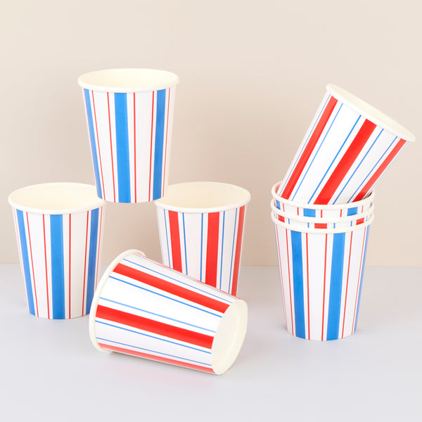 Our paper cups, suitable for hot and cold drinks, feature a natural red, white and blue striped design, ideal for a chic celebration. Image1