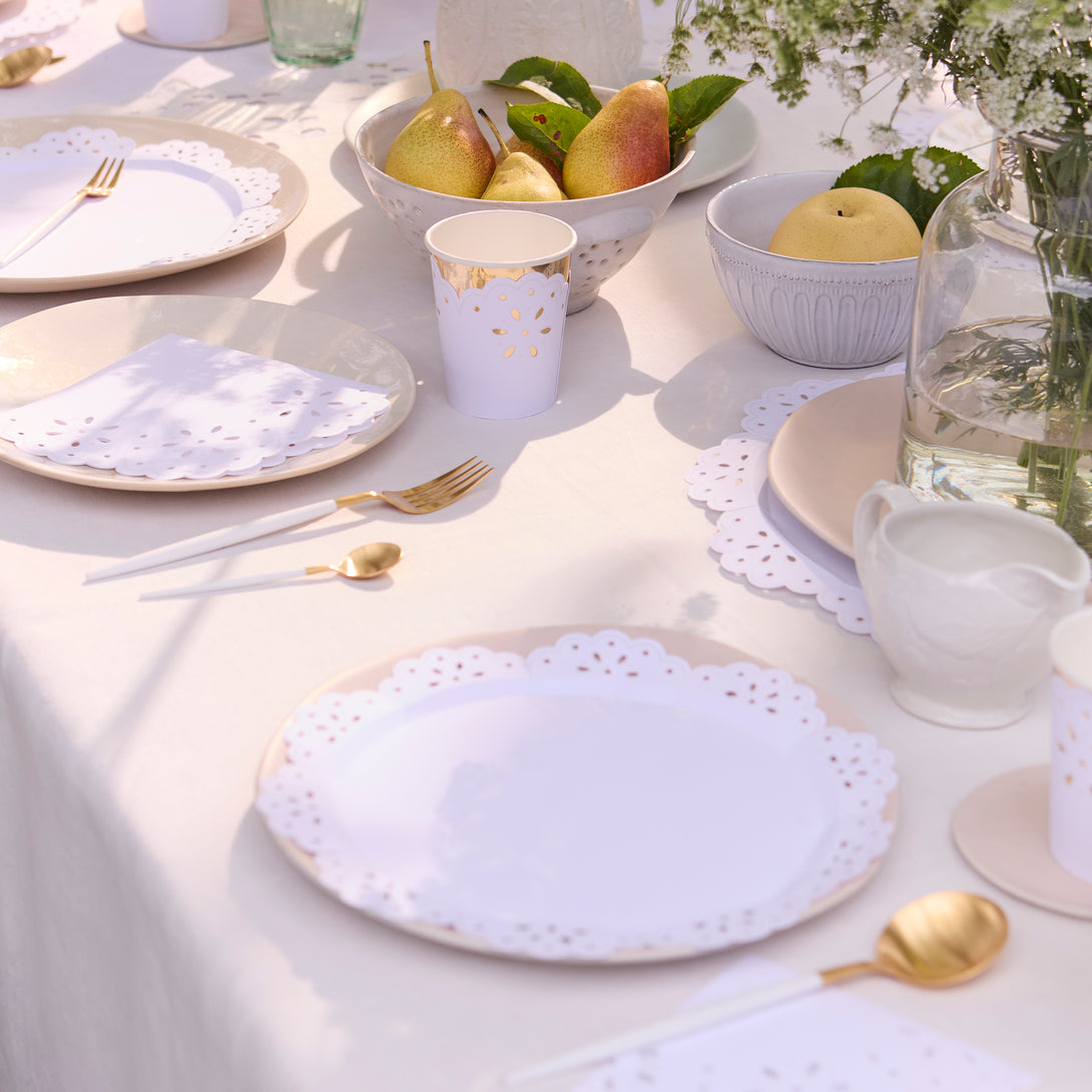 Our large party napkins, in white, have an embossed lace design and make pretty baby shower napkins.