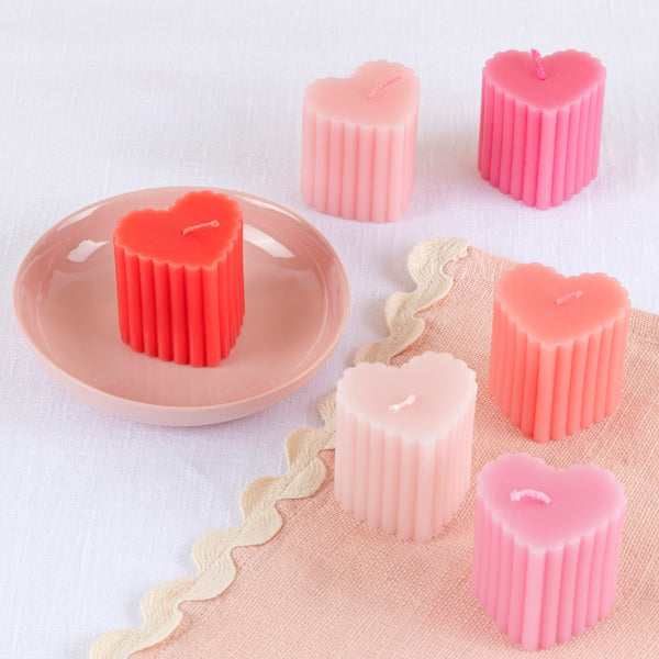 Our scalloped heart candles are wonderful to add to your Valentine's Day decorations for a soft glow on the table or mantel, or as a pretty gift. Image1