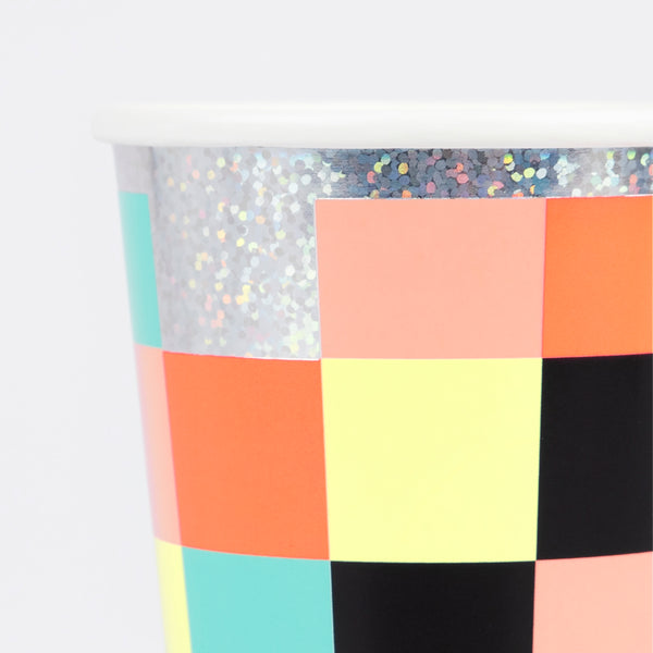 Throw a cool birthday party with a video theme with our set including paper plates, cups, napkins and an shimmering tinsel garland. Image1