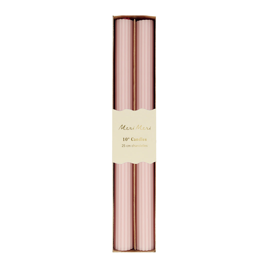 Our tall candles, in a pink color with ridged details, add a stunning look to any party.