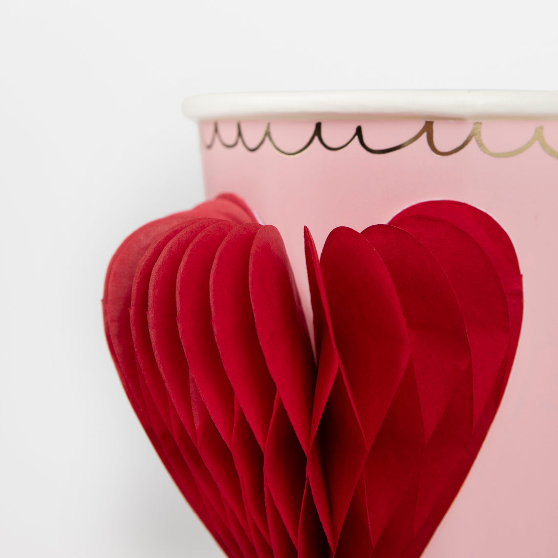 Our pink cups, with honeycomb red hearts, are the perfect party cups for Valentines.