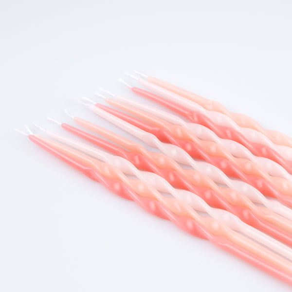 Our twisted candle set, with pink candles and peach candles, are packaged in a Liberty print design box, ideal as a candle gift. Image2