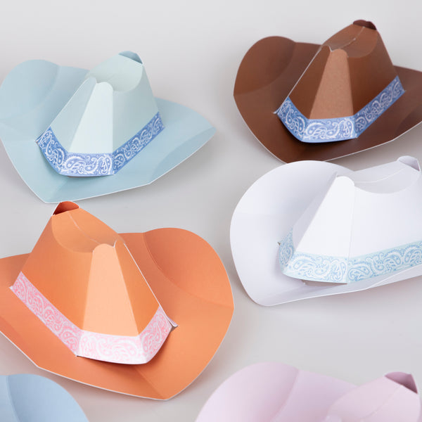 Our mini party hats are made in the shape of Western hats, crafted from paper in 8 fabulous colors. Image3