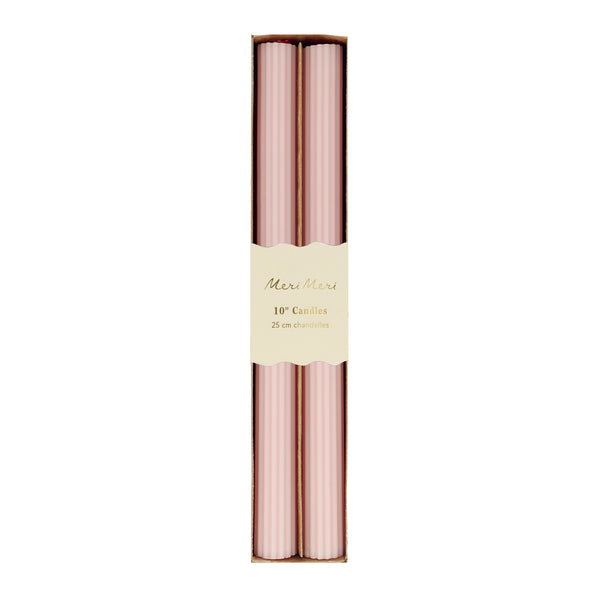 Our tall candles, in a pink color with ridged details, add a stunning look to any party. Image5