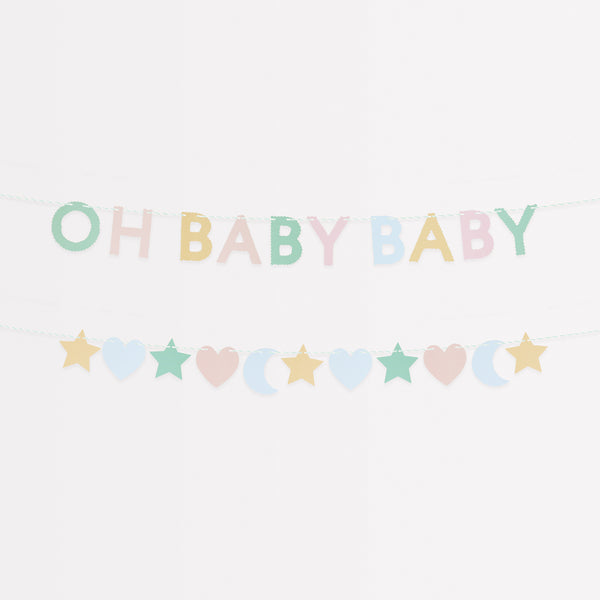 Our baby shower garland set features stars, moons, hearts and the words 'Oh Baby Baby', in pretty pastel colors.