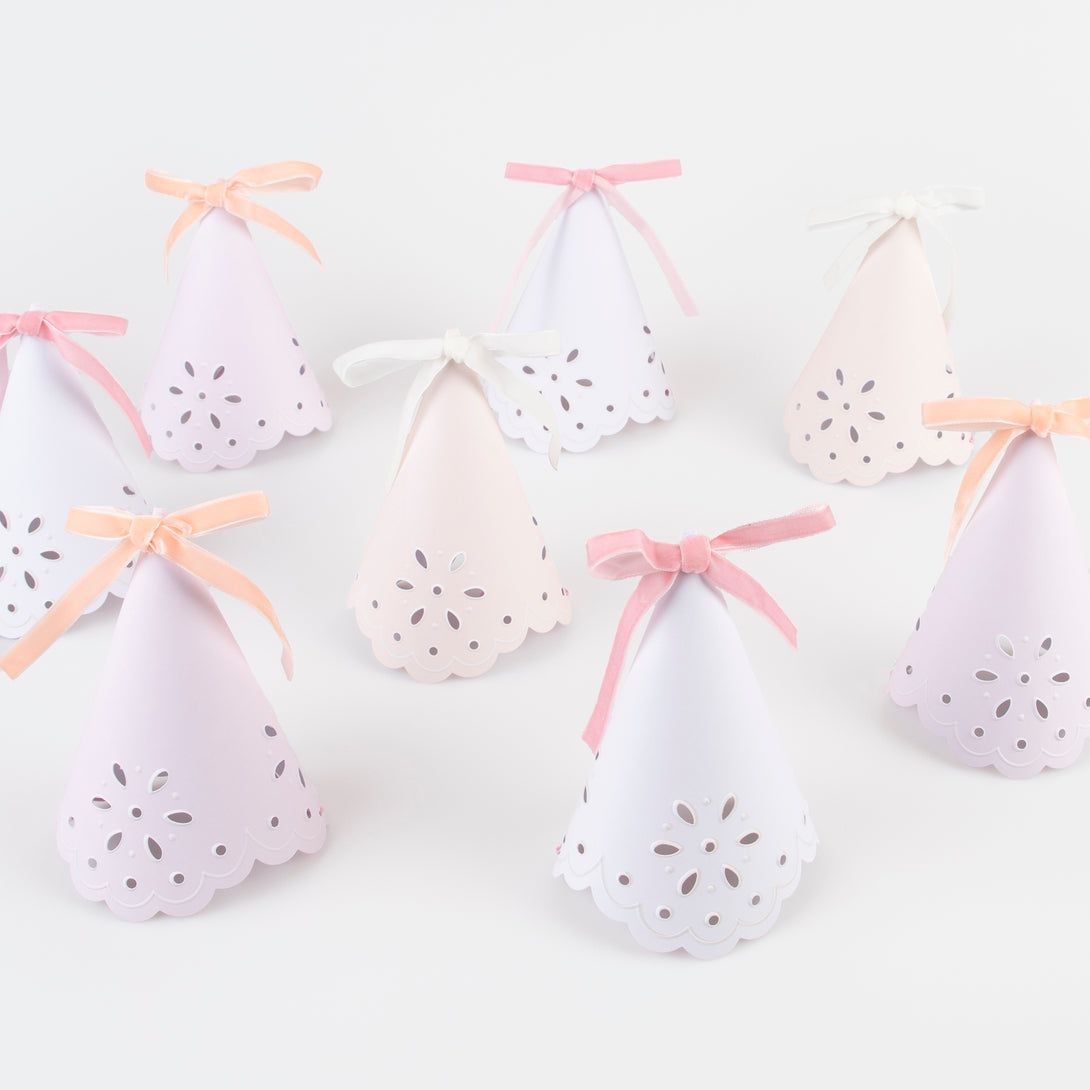 Make your guests look princess perfect with our luxury party hats with a stylish broderie anglaise design and soft velvet ribbons.