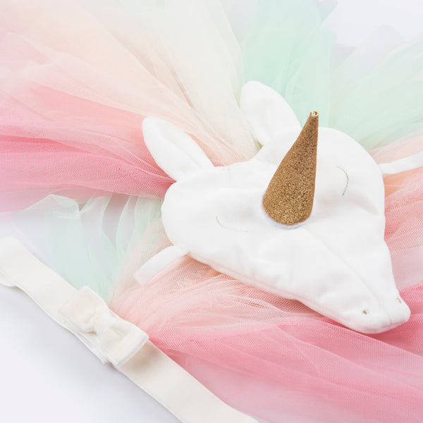 Our unicorn costume features a headpiece with a gold glitter horn rind rainbow tulle mane and a waistband with a rainbow tulle tail. Image4