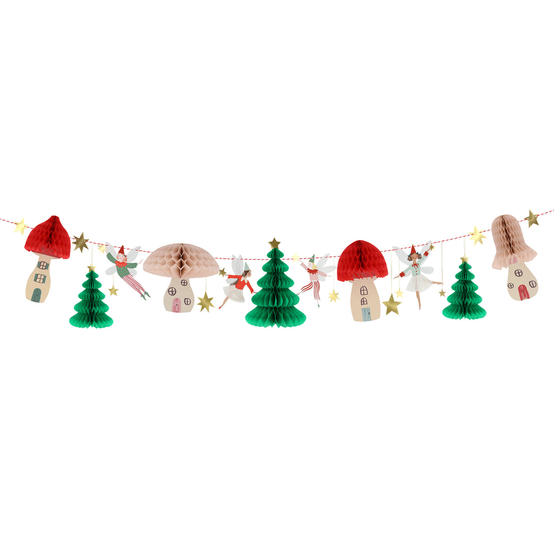 Our special Christmas party supplies include mushrooms and fairy designs on party plates, party napkins and cups, and a festive garland.