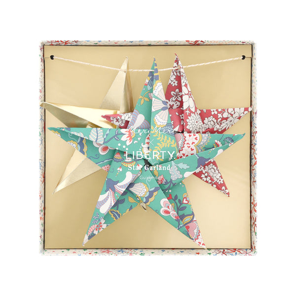 Let our star garland, designed with joyful Liberty star and floral prints and gold foil details, add an elegant touch to your Christmas décor. Image7