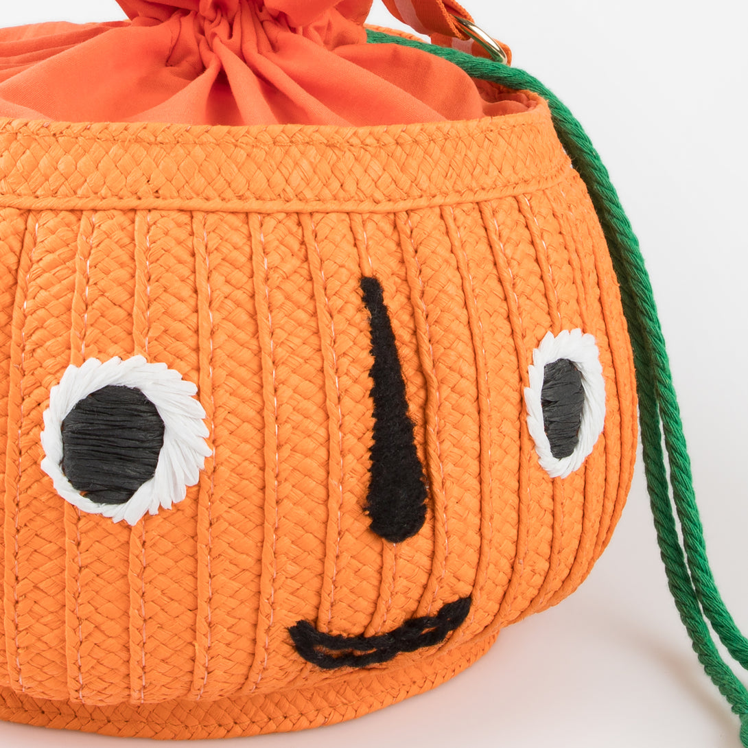 Our Halloween basket has a cute pumpkin face and fun tassels.