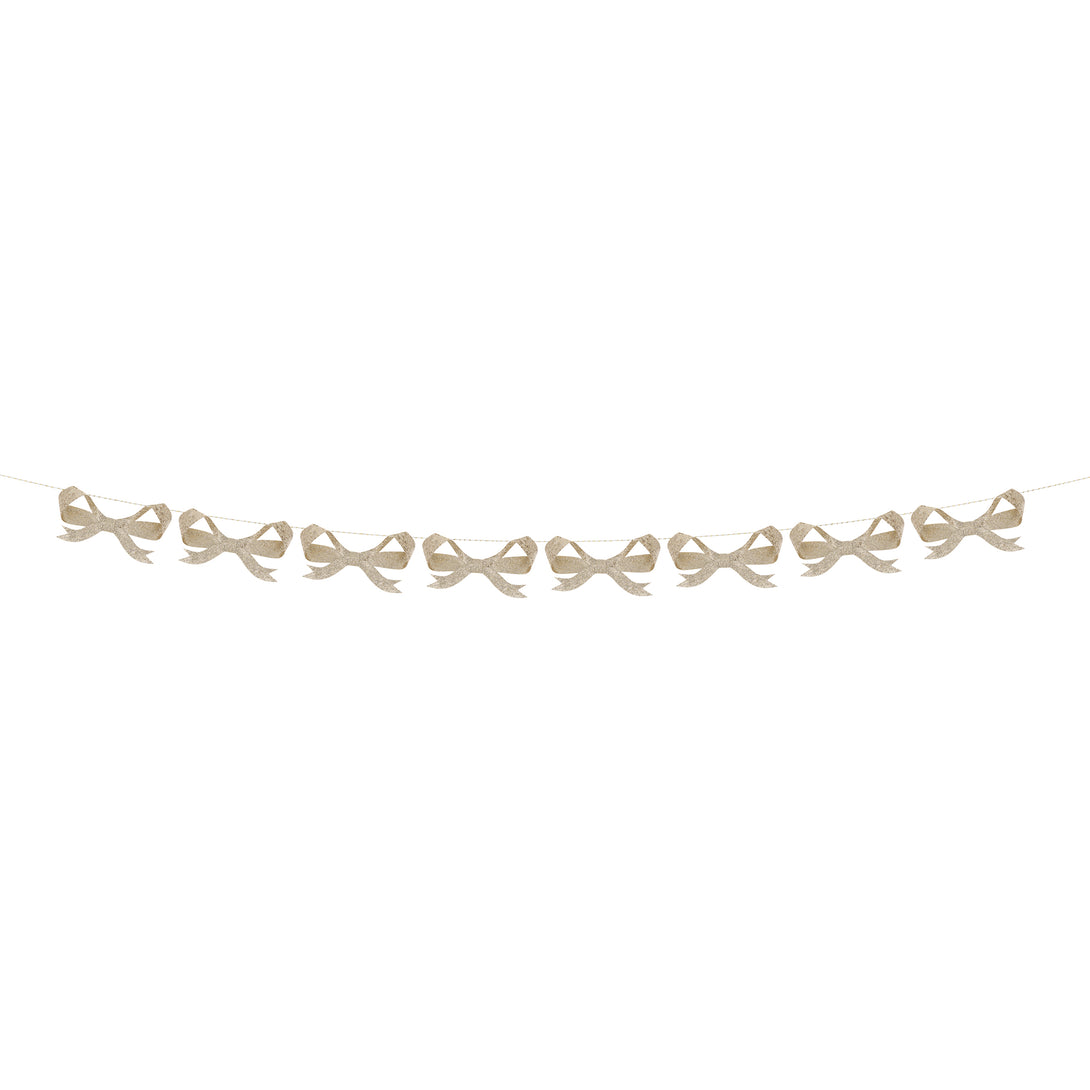 Use our bow garland, with paper bows sprinkled with chunky gold glitter, for a fabulous festive look. Image3