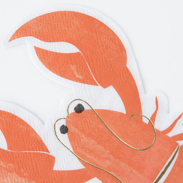 Our red napkins, in the shape of a lobster, make lovely cocktail napkins or are perfect for an under-the-sea party decorations. Image3