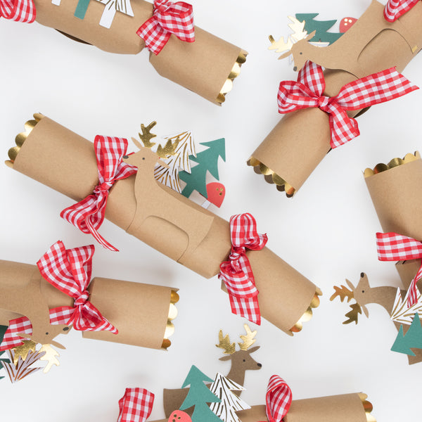 Our family crackers, with adorable 3D animal and woodland details,  contain a "Guess Who' game for family fun. Image6