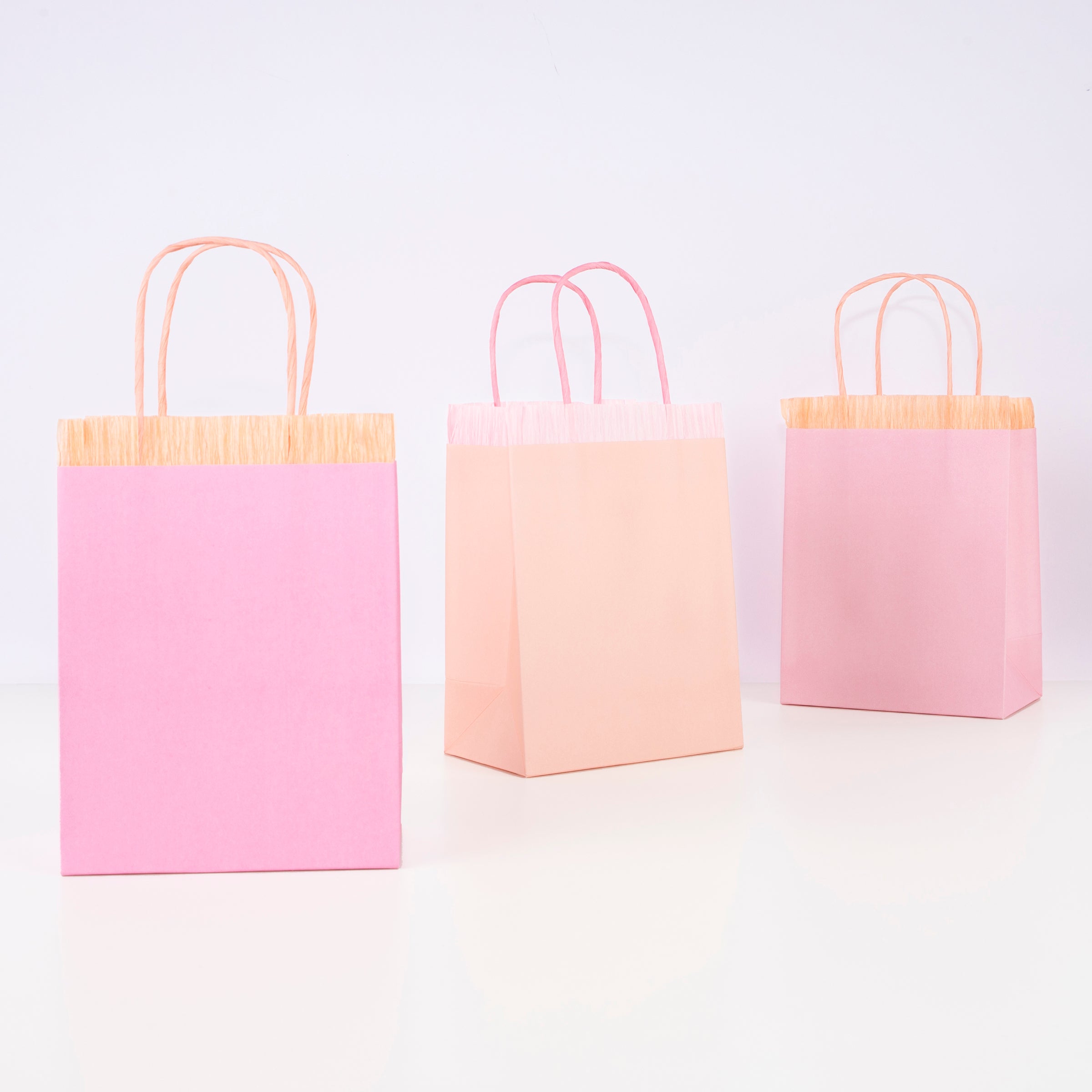 Our pink fringed bags are perfect as paper gift bags and party gift bags.