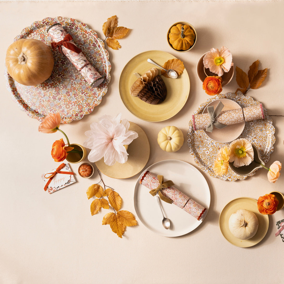 Our Thanksgiving party crackers feature Liberty floral prints, velvet bows and ric rac, containing a wooden brooch or keyring, party hat and joke. Image3