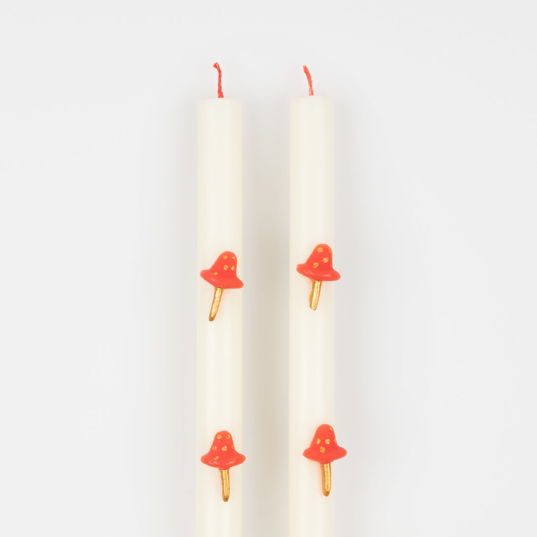 Our Christmas candles, with red and gold mushroom details, have fun red wicks and are perfect as Christmas table decorations.