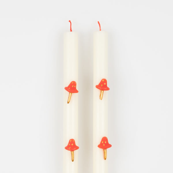 Our Christmas candles, with red and gold mushroom details, have fun red wicks and are perfect as Christmas table decorations. Image4
