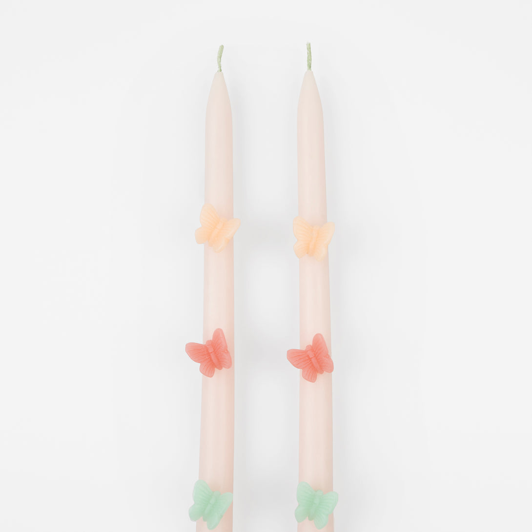 Our tall candles, in pink with colored wax butterflies, are perfect as princess party candles or fairy party candles.