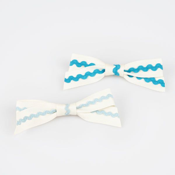 Our bow hair clips feature on-trend ric rac in pretty colors, fabulous as kids accessories. Image4
