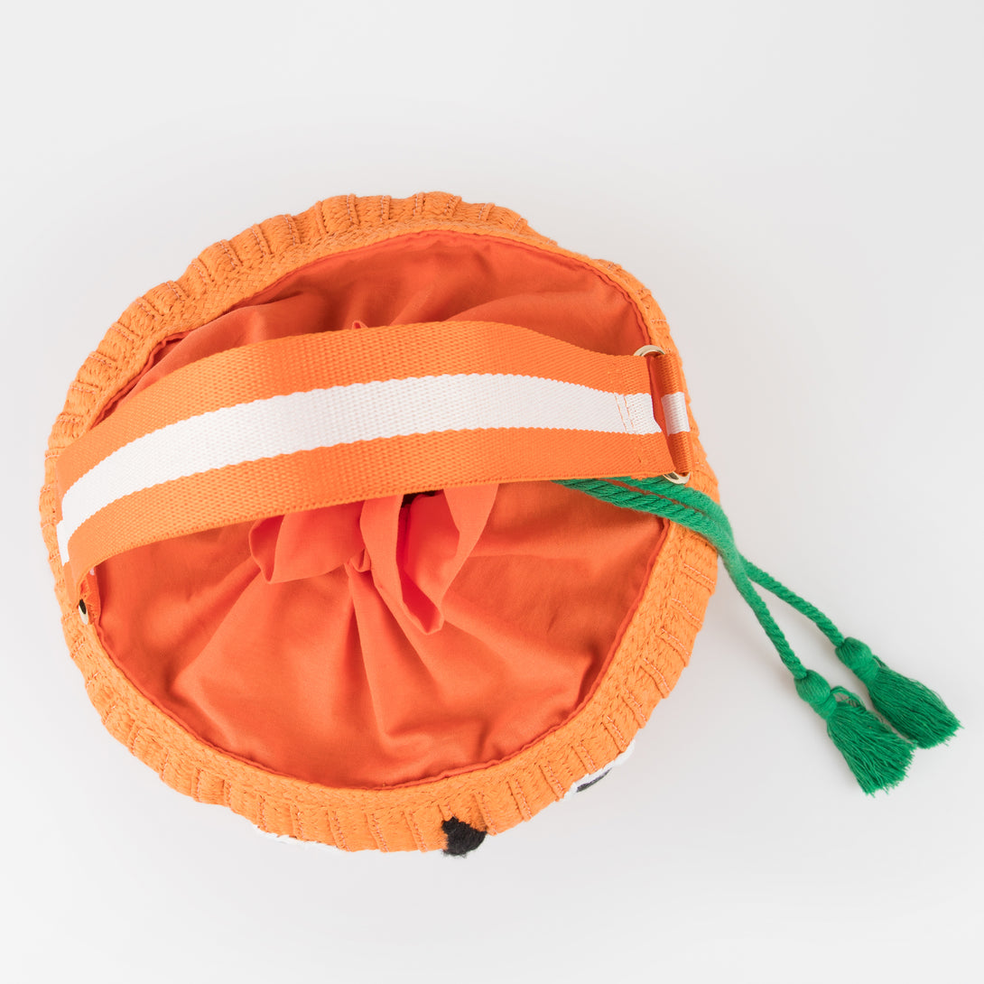 Our Halloween basket has a cute pumpkin face and fun tassels.