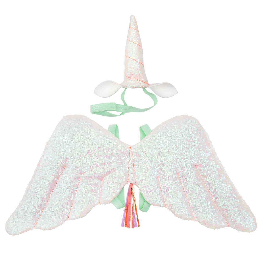 The glittery wings and unicorn headdress are crafted from pink iridescent glitter sequin fabric, with ribbon tassles.