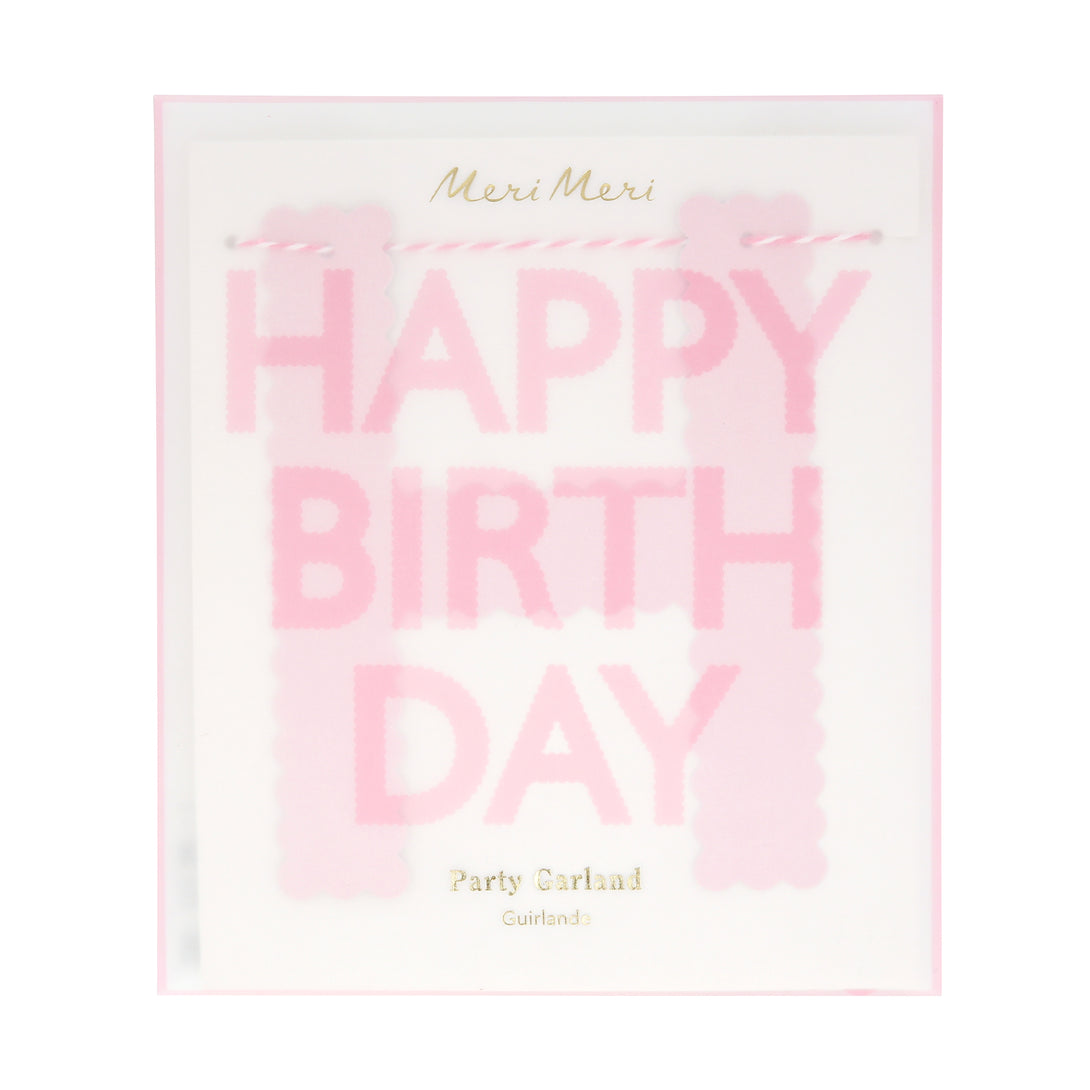 Our pink garland, made with scalloped pink paper, is a pretty decoration for a birthday party.