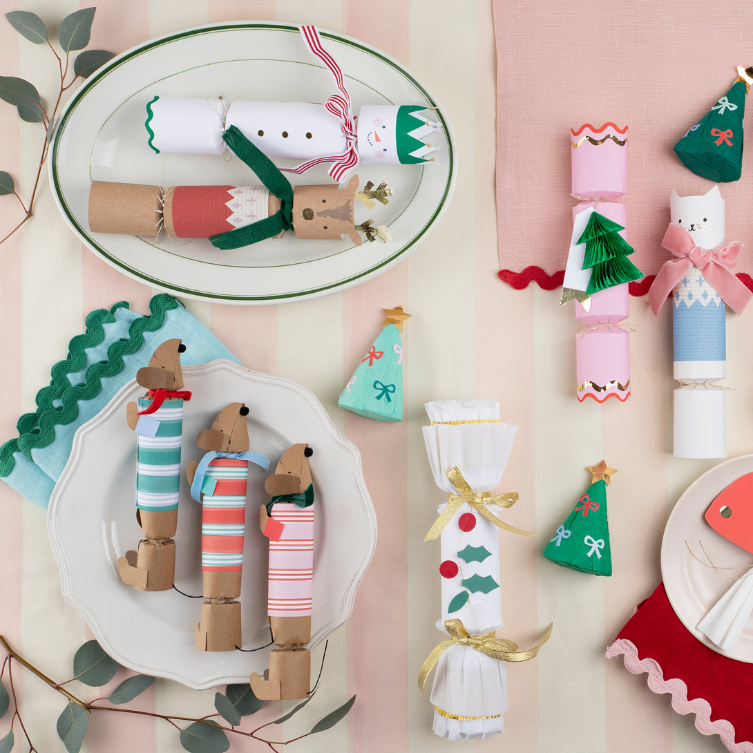 Our sausage dog Christmas crackers are utterly charming, and each contain a paper hat, joke and a sausage dog pin badget.