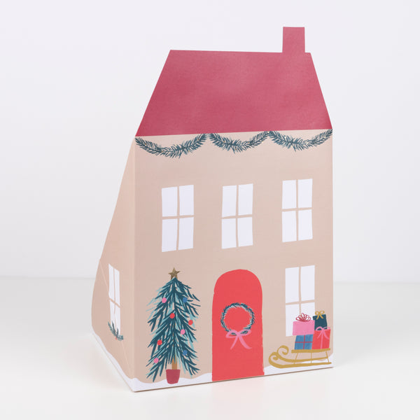 This paper doll house is designed as Santa's home, complete with his reindeer, elves, Christmas tree and gifts. Image4