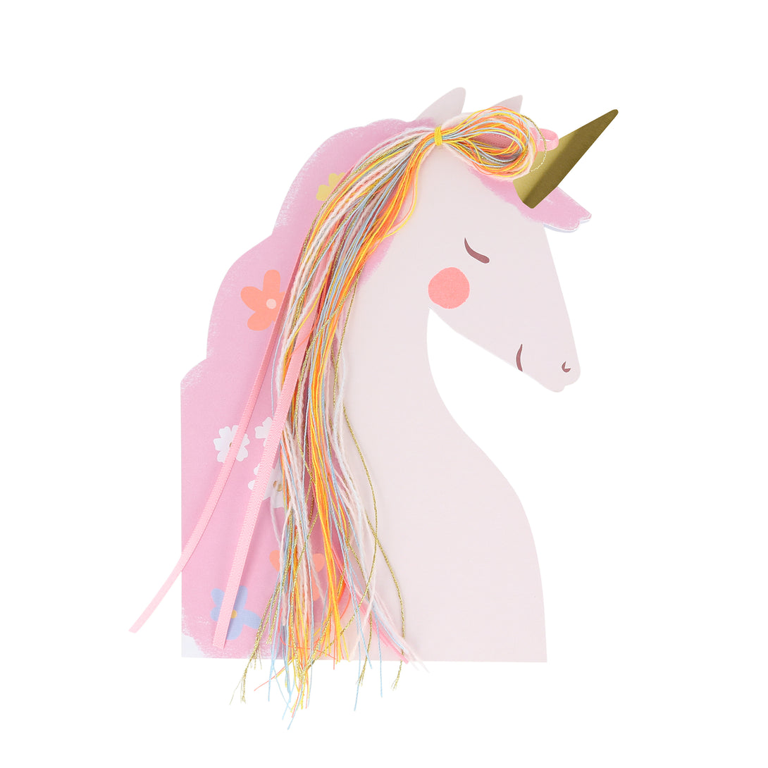 Our unicorn birthday card features a pretty unicorn with a mane made with sparkly thread, colorful yarn and light pink satin ribbon/