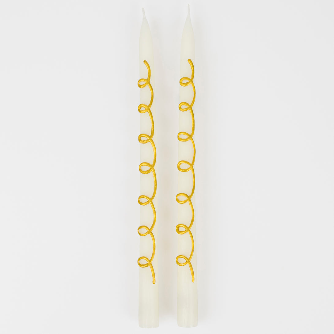 Our taper candles, with a gold swirl design, are perfect as Christmas decorative candles.