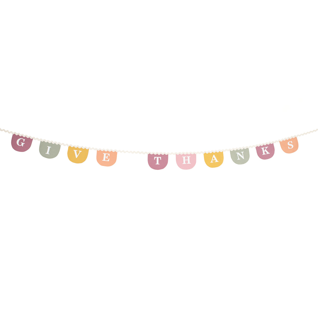 Our Thanksgiving garland, crafted in fabric, is a reusable decoration to add to your Thanksgiving party supplies.