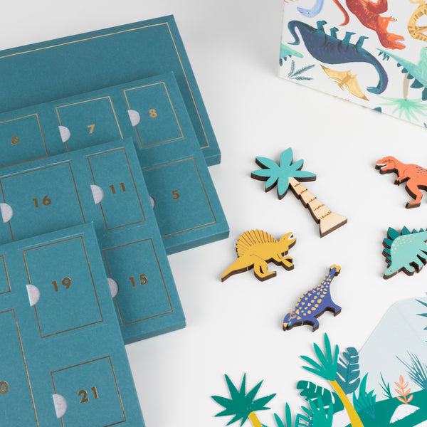 This is the perfect advent calendar for boys, featuring wooden dinosaur toys. Image3