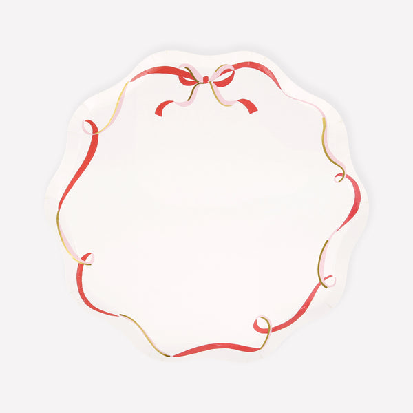 Our side plates, made from high-quality paper, feature a red, pink and gold ribbon bow design, ideal for your Christmas dinner. Image1