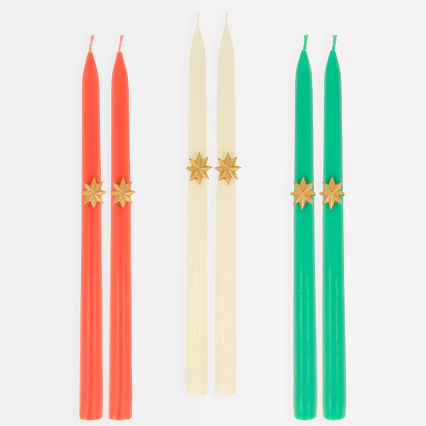 Our Christmas tall candles features gold wax stars and colored wicks for a sensational effect, a great host gift. Image3