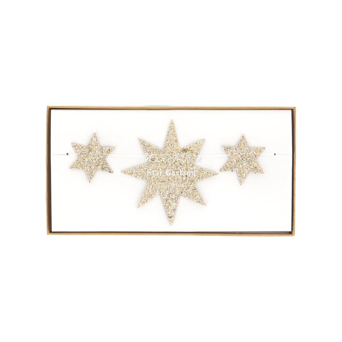 Hang up our Christmas garland, with gold glitter stars, to add a special shimmering look to your festivities. Image3