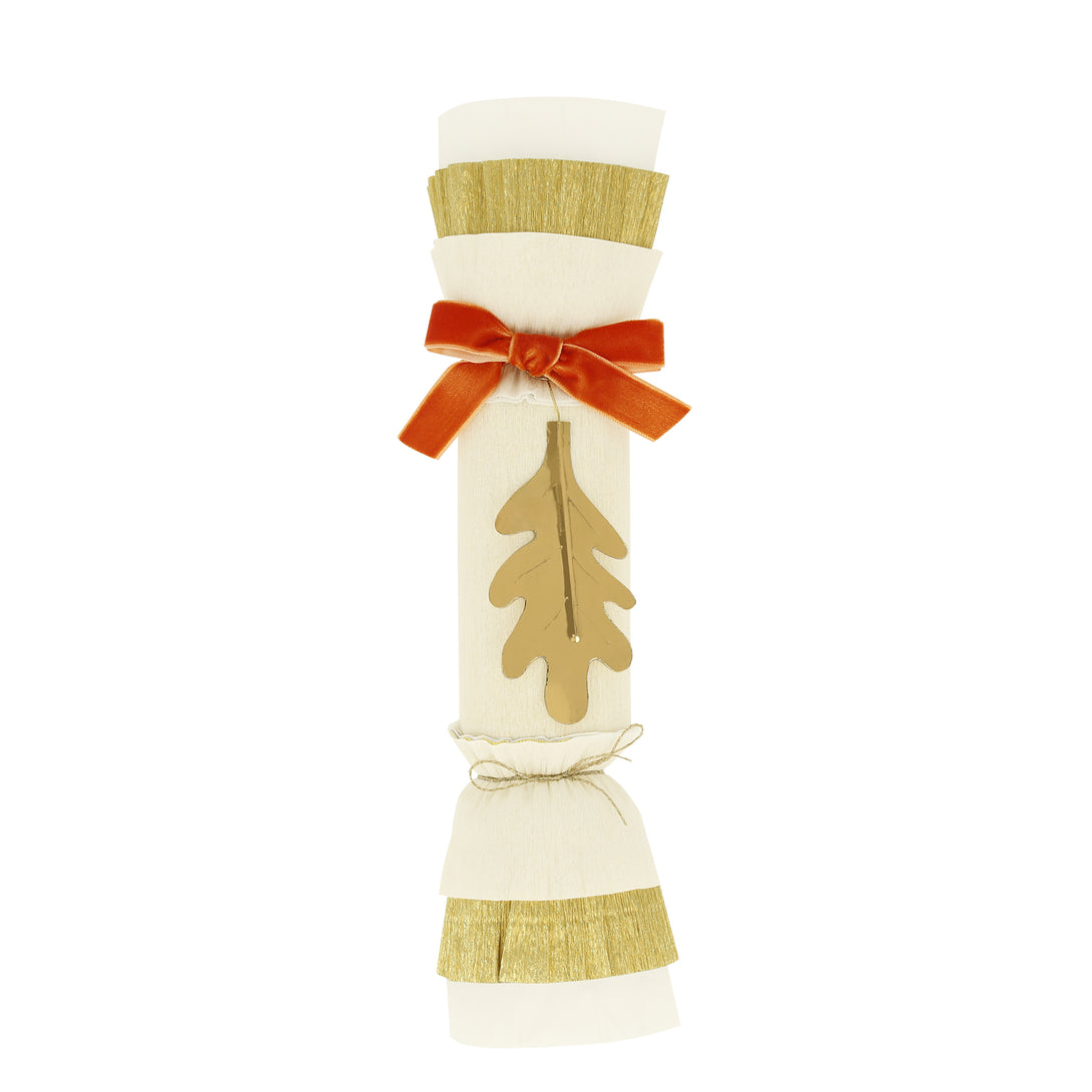 Our Thanksgiving crackers are made with crepe paper, golden leaves and velvet bows, and each have a luxury gift of a brooch or keyring.