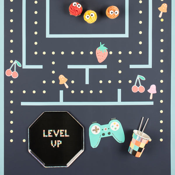 Our dinner plates are designed for a retro party for gamers, with lots of holographic silver foil, neon colors and an octagonal shape. Image2