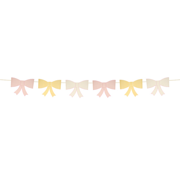 Our large garland, with big bows in soft colors, is perfect as a wall decoration. Image6