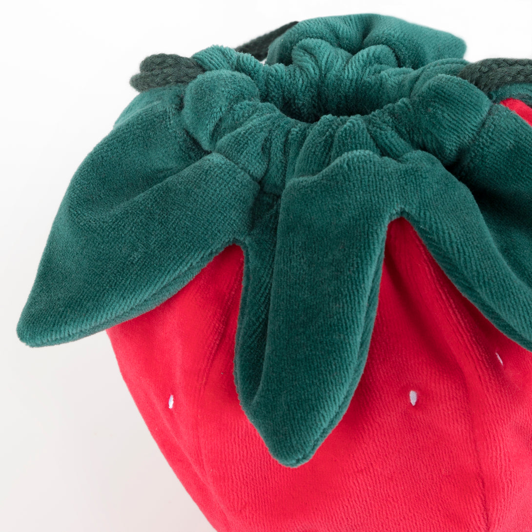 Our accessories for kids range includes a stunning strawberry bag crafted from soft velvet.