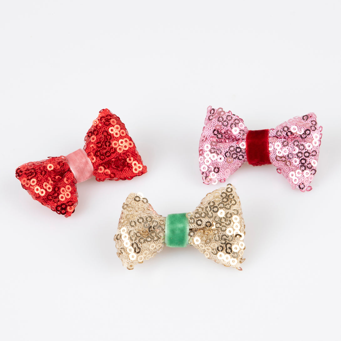 Accessorize your Christmas hairstyle with our sequin bows with velvet details, simply clip on for instant style.