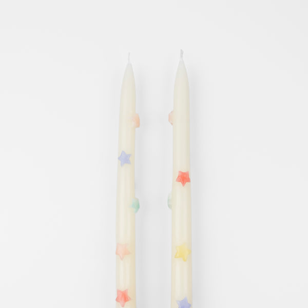 Our taper candles, with colored stars, will look great as table candles or on placed on the mantel. Image2