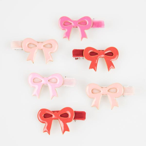 Our luxury red and pink hair clips feature enamel bows and velvet ribbons - the perfect Valentine's hair accessories for kids. Image3