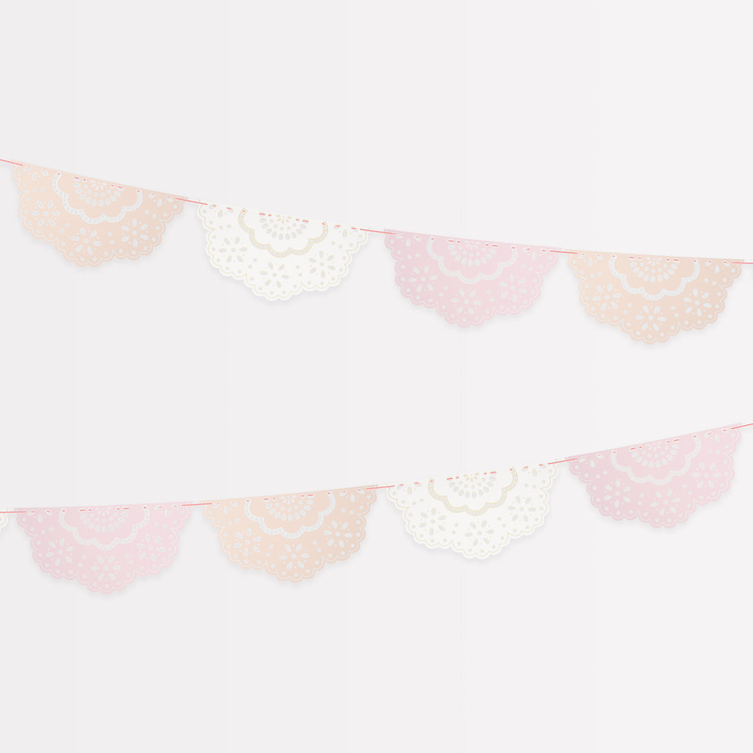 Our party garland, in pretty pink, peach and ivory with lace design details, makes an amazing baby shower garland.