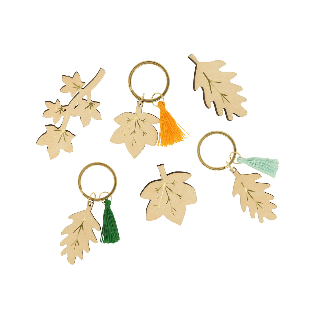 Our Thanksgiving party crackers feature Liberty floral prints, velvet bows and ric rac, containing a wooden brooch or keyring, party hat and joke. Image2