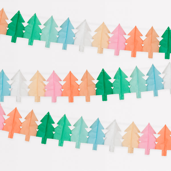 Our hanging Christmas decorations feature tissue paper Christmas trees in lots of colors for a merry and bright look.