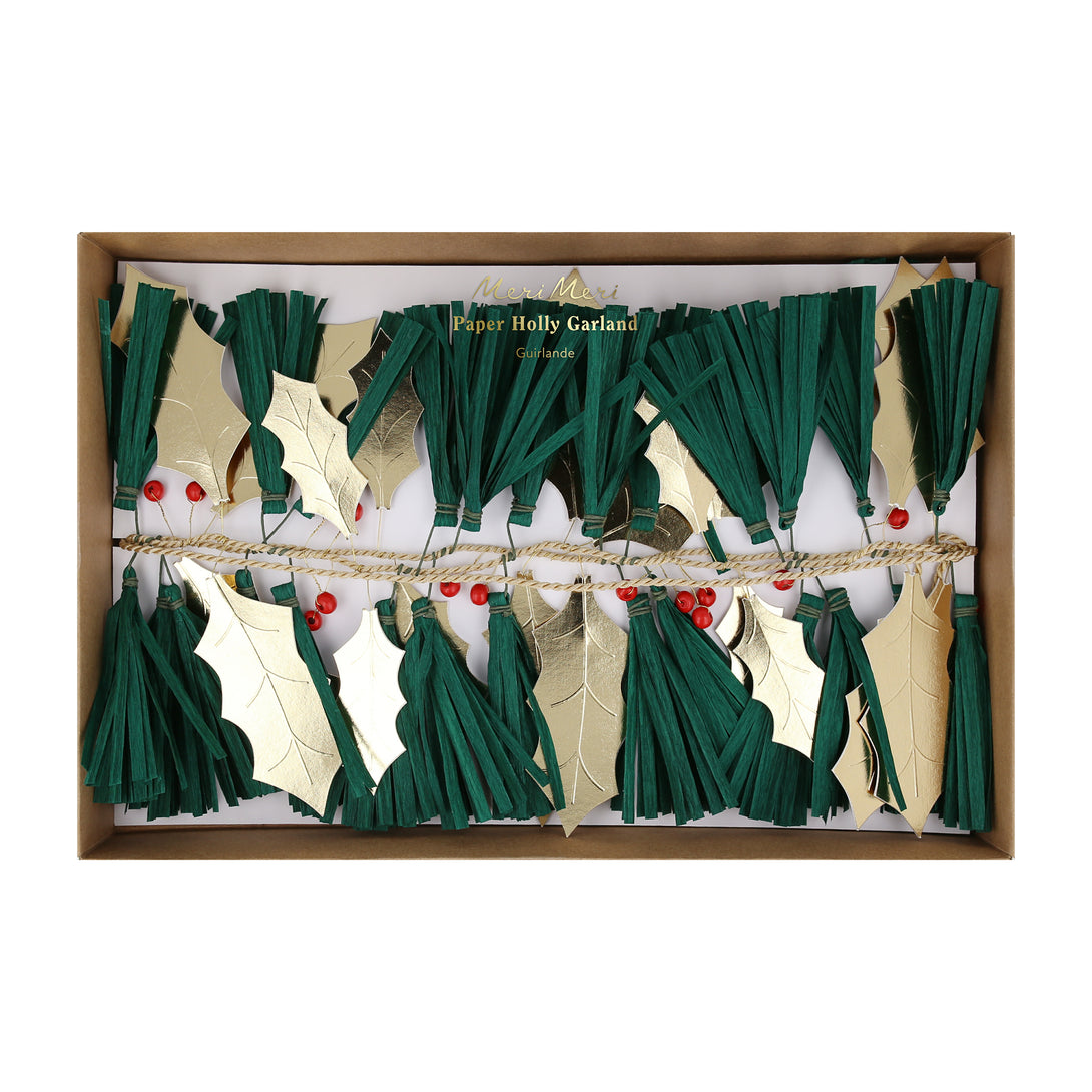 Our festive garland includes holly, berries and pine needles crafted from paper and wooden beads for a special Christmas foliage look.