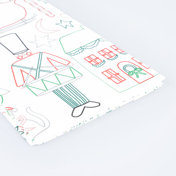 Our Christmas tablecloth is a paper tablecloth with Christmas icons to color in, for lots of fun. Image2