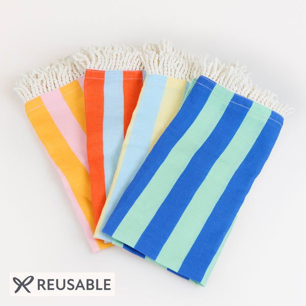 Our fabric napkins, made with a linen and cotton blend, have 4 vibrant striped colorways, perfect to add elegance to any meal. Image1